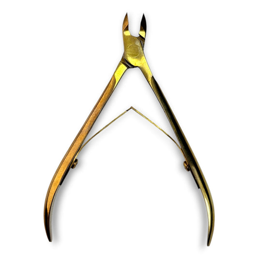 Golden nail nippers, precision stainless steel, designed for manicure and pedicure care.