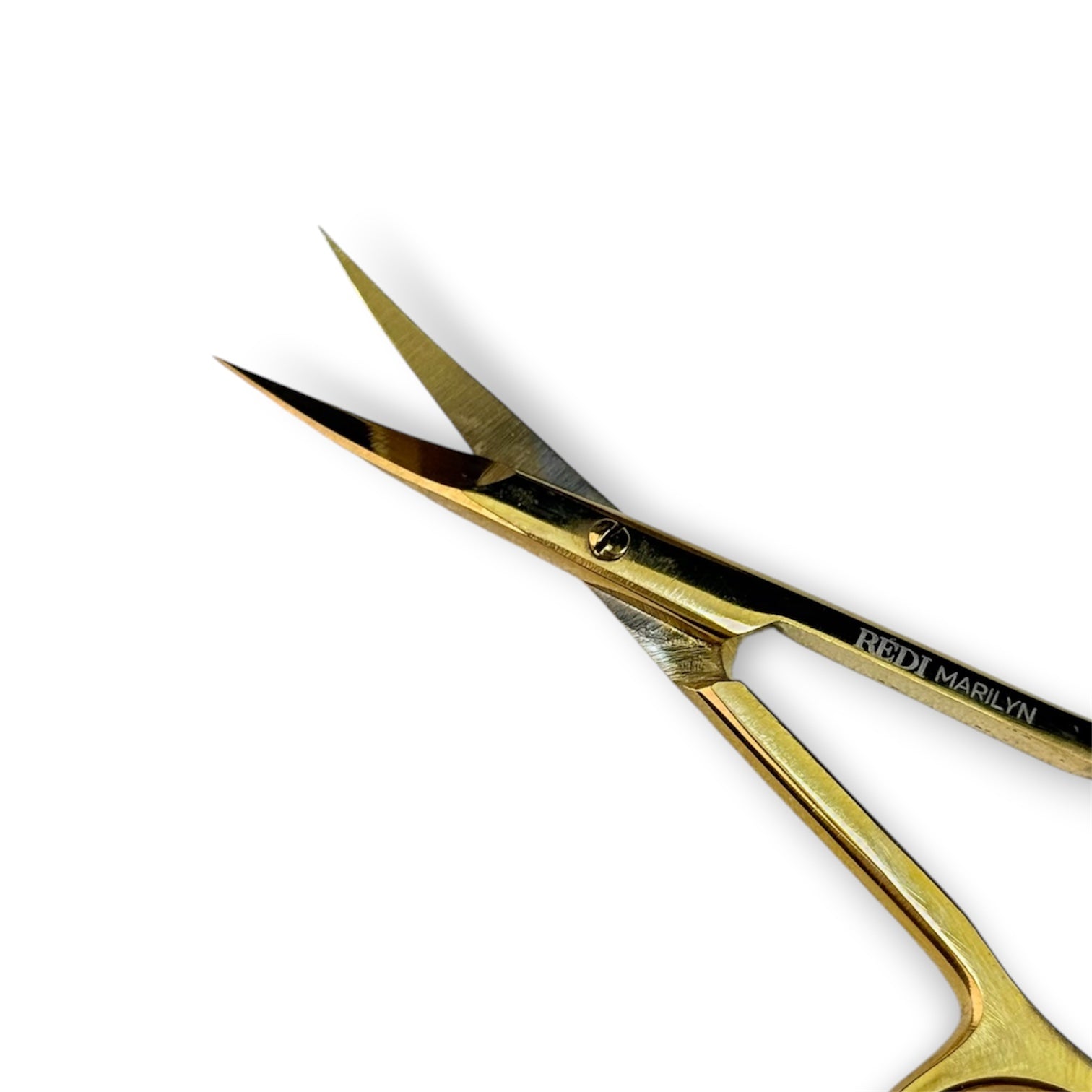 Gold cuticle scissors by Redi Marilyn, featuring sharp stainless steel blades for precise trimming.